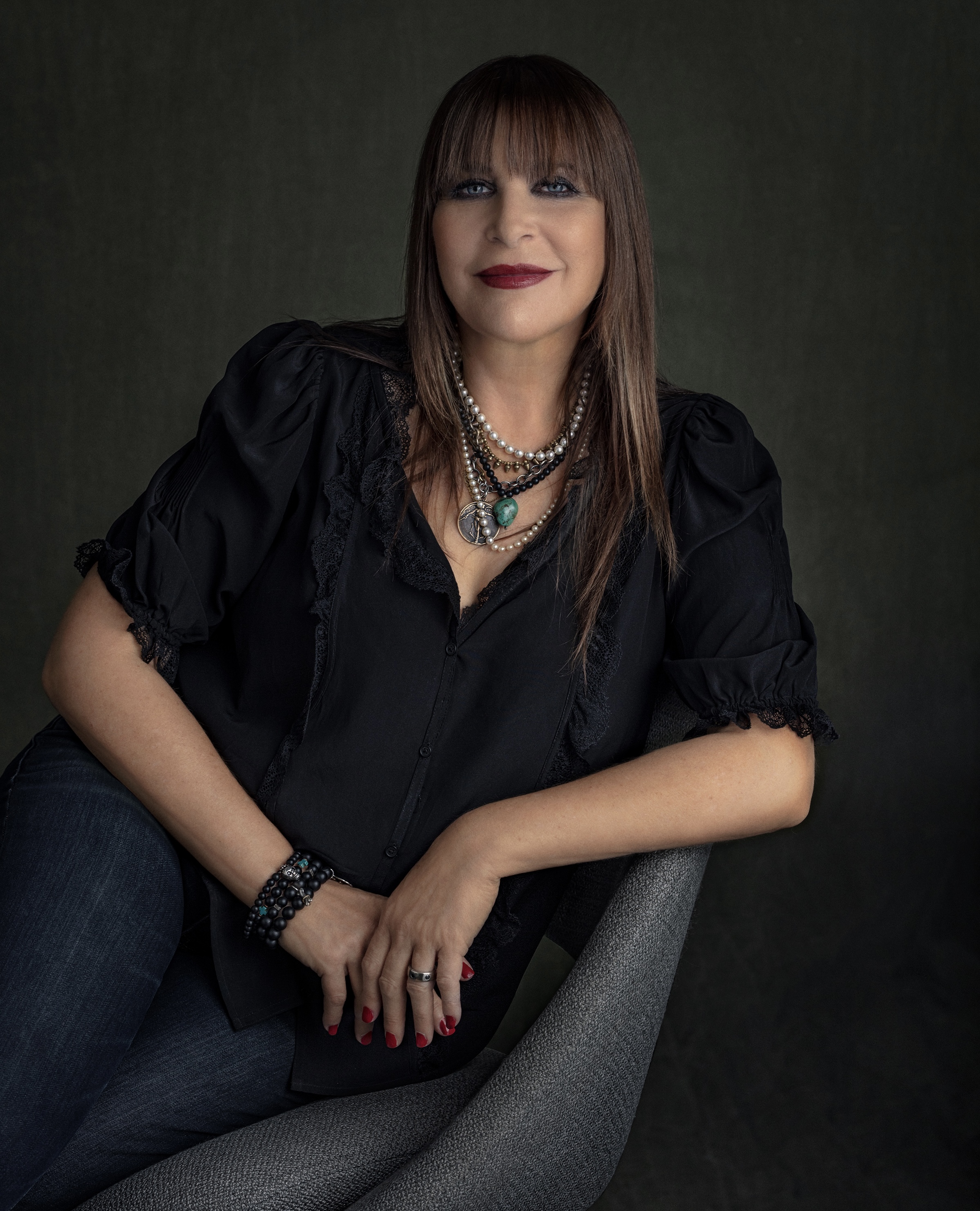 photo of Jennifer B. Gardner sitting on the stairs